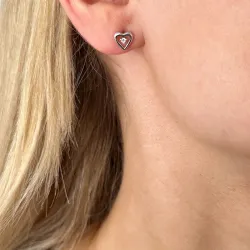 Små hjärta diamant örhängestift i 14 karat vitguld med diamanter 