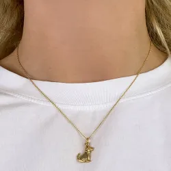 hundar hängen i förgyllt silver