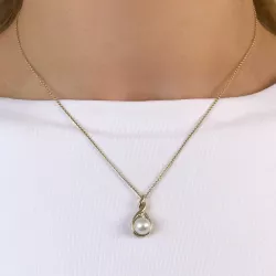 Pärla diamantberlocker i 9 carat guld 0,03 ct