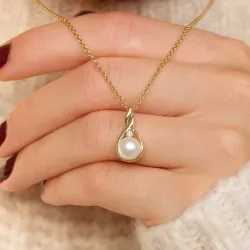 Pärla diamantberlocker i 9 carat guld 0,03 ct