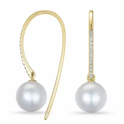 pärla örhängen i 9 karat guld med diamant 