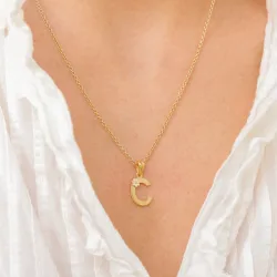 bokstav c hängen i förgyllt silver