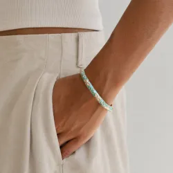 vattentät blommor ljusblå bangle i förgyllt stål - OCEANA