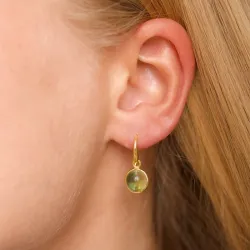 runda ljusgrön kristal örhängen i förgylld mässing - Loom Stones