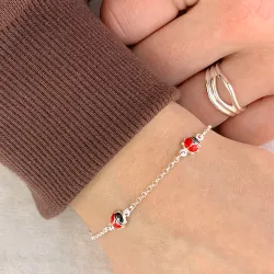 nyckelpiga armband i silver med hängen i silver