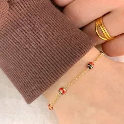 nyckelpiga armband i förgyllt silver med hängen i förgyllt silver